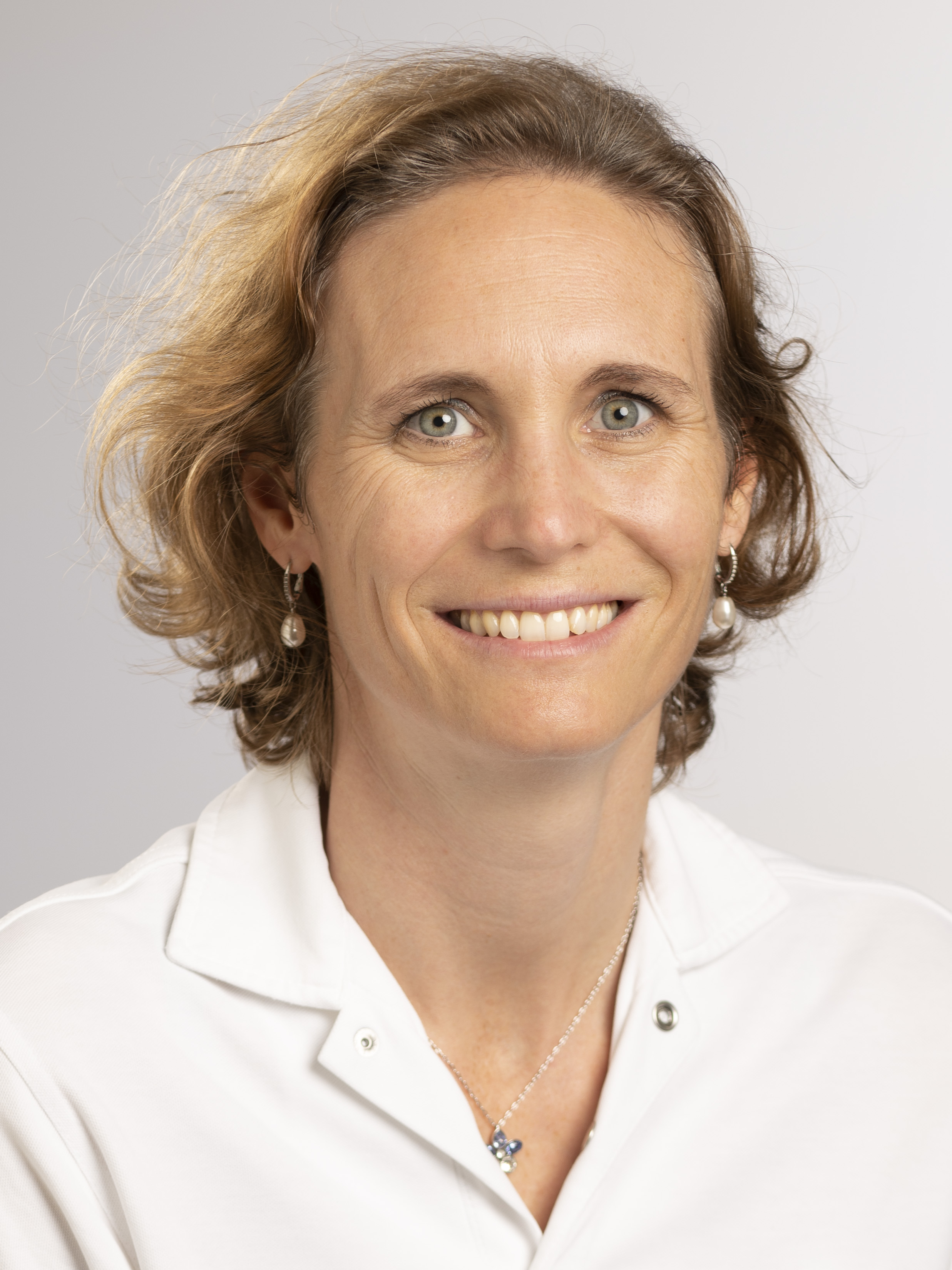 Mme Véronique Ditesheim