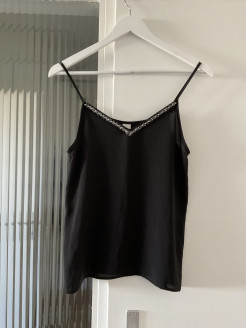 Black top with pearl detail