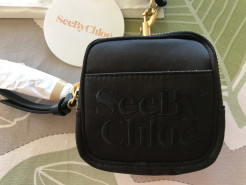 See by Chloé clutch bag