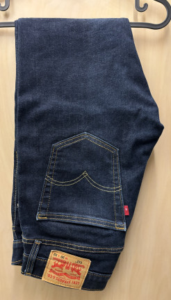 Levis 512 raw jeans