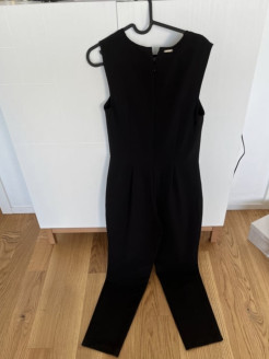 Black jumpsuit with lace details by Guess size S