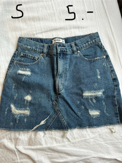 Denim mini skirt with holes