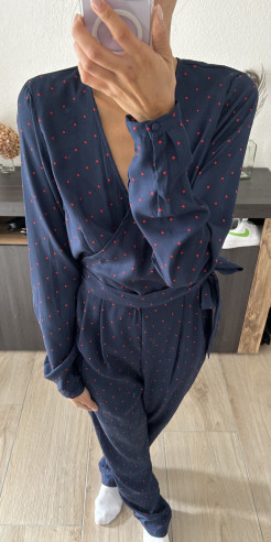 Midnight blue jumpsuit with red polka dots