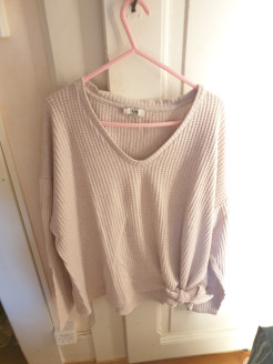 Pink jumper with bow