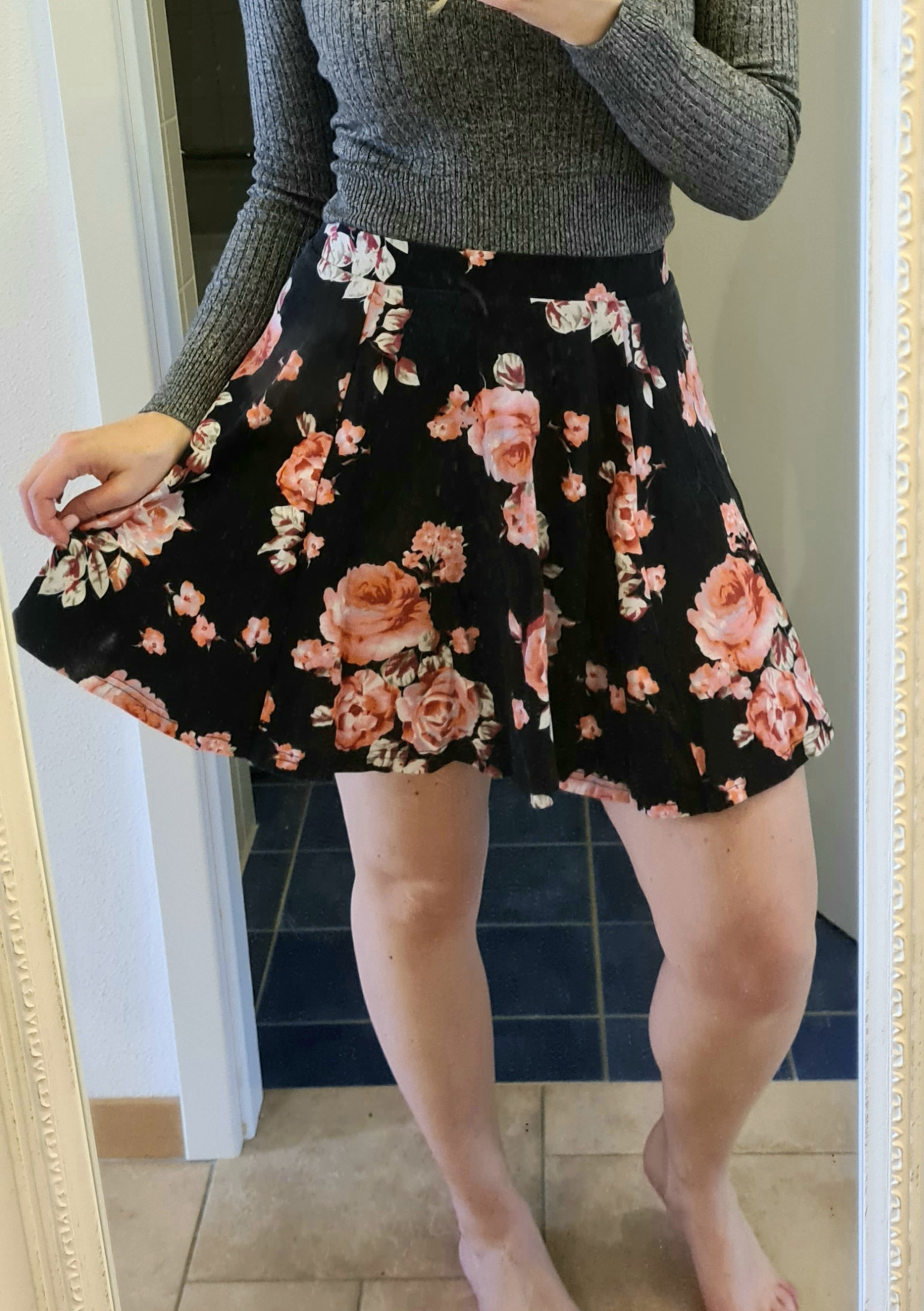 Black mini-skirt with pink flowers 🌷