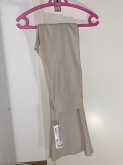 Flared beige trousers