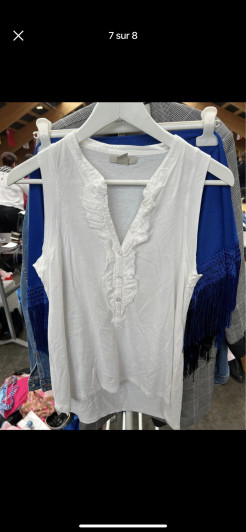 White top with collar detail