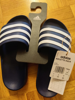 Adidas Brand new sliders (with tag, never used)