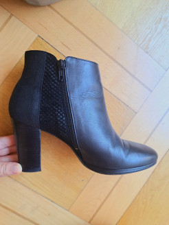 High-heeled leather boots