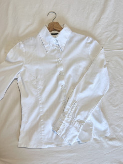Elegant white long-sleeved blouse