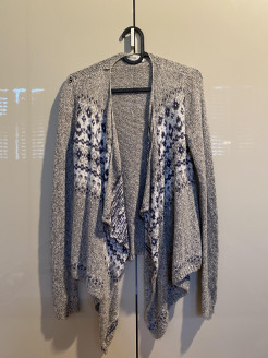 Grey jumper with blue and white motifs