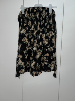 Black floral jumpsuit with bare shoulders