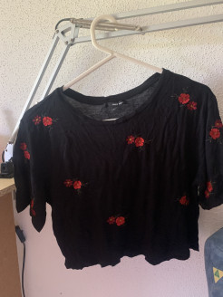 top with red flowers