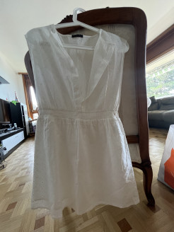 White dress With small holes.
