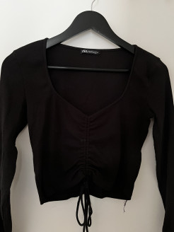 Pull top noir taille L