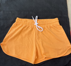 Orange sports shorts