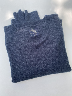 Dark blue jumper with a few white threads