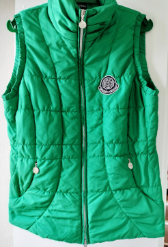 Green quilted sleeveless jacket