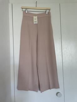 Powder pink flared trousers