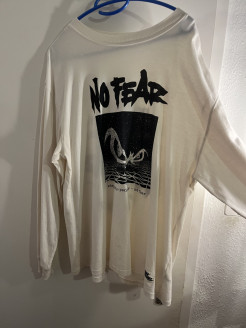 Pull Nofear x H&M léger et neige