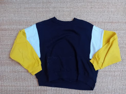 Pull noir, blanc et jaune