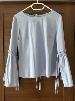 Light blue long-sleeved blouse