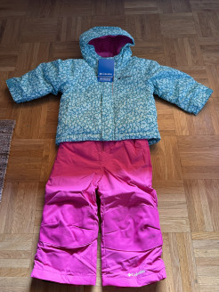 Columbia BUGA ski suit in turquoise and fuchsia.