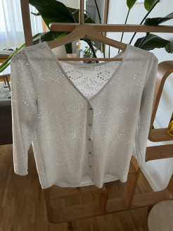 White long-sleeved top