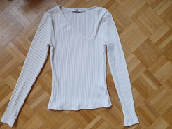 White long-sleeved top