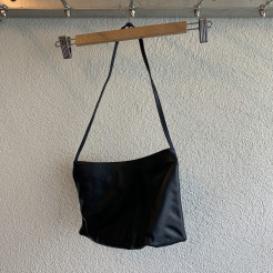 Black leather clutch bag
