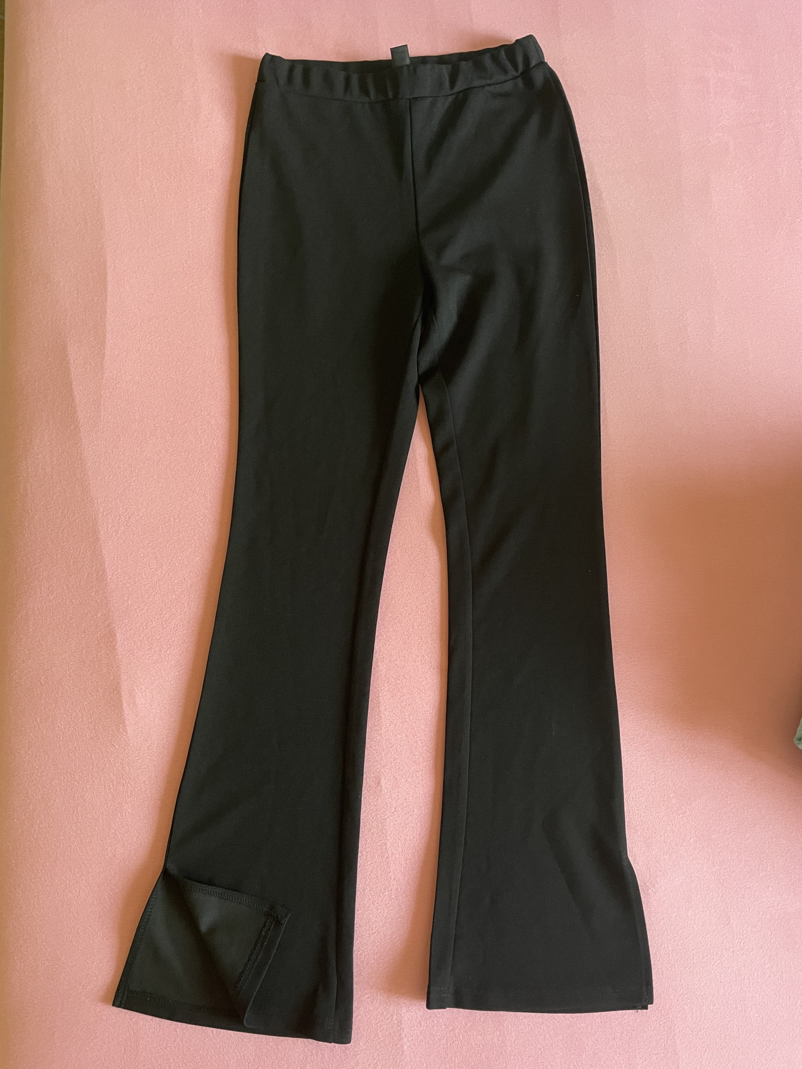 Black bell-bottom trousers