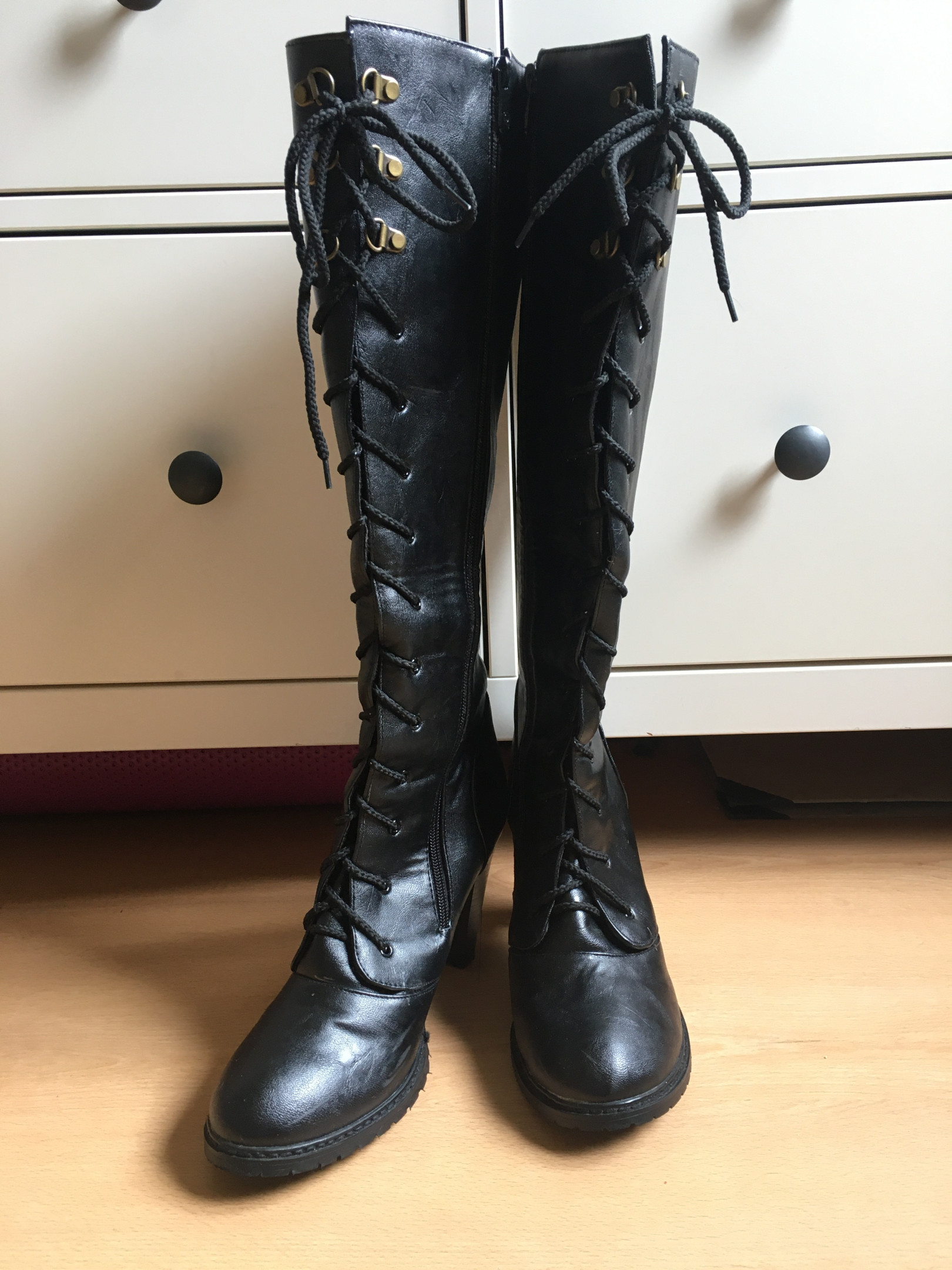 Tall lace-up boots