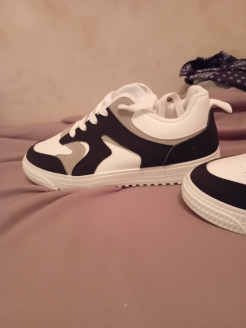Black and white skater trainers