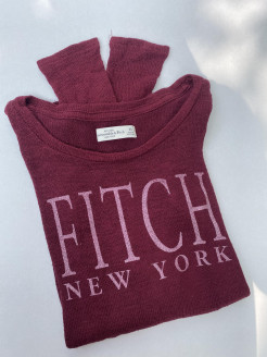 Long-sleeved burgundy T-shirt with pink writing