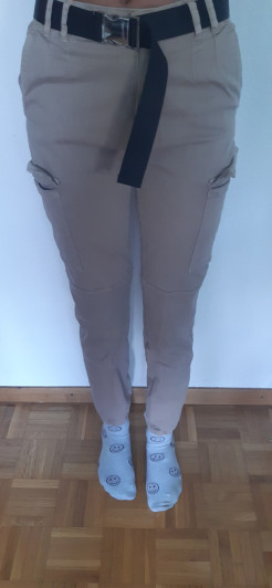 Beige trousers with belt