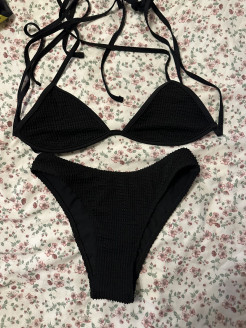 Black swimming costume