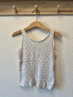 White tank top with black weights