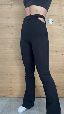 Black bell-bottom trousers with hip holes