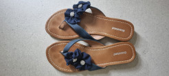 Blue flip-flops with flowers
