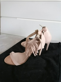 Nude fringe heels
