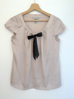 Pink satin blouse with black bow