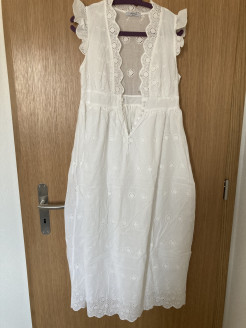 Dress in broderie anglaise as new.