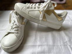 White and gold trainers