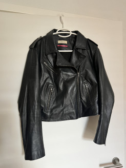 Short black leather perfecto jacket