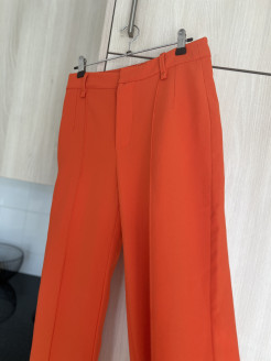 Orange suit trousers