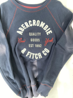 Dark blue jumper with white and red Abercrombie logo