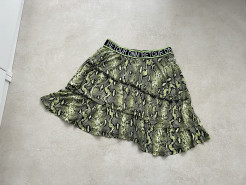 Girl's green snake skirt
