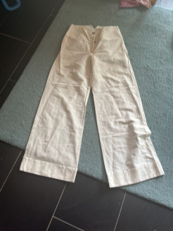 White linen trousers