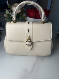 Creamy white handbag