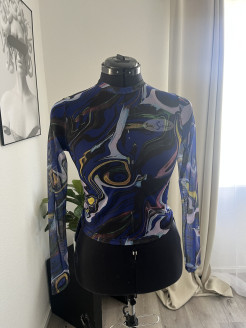 Blue long-sleeved top with pattern